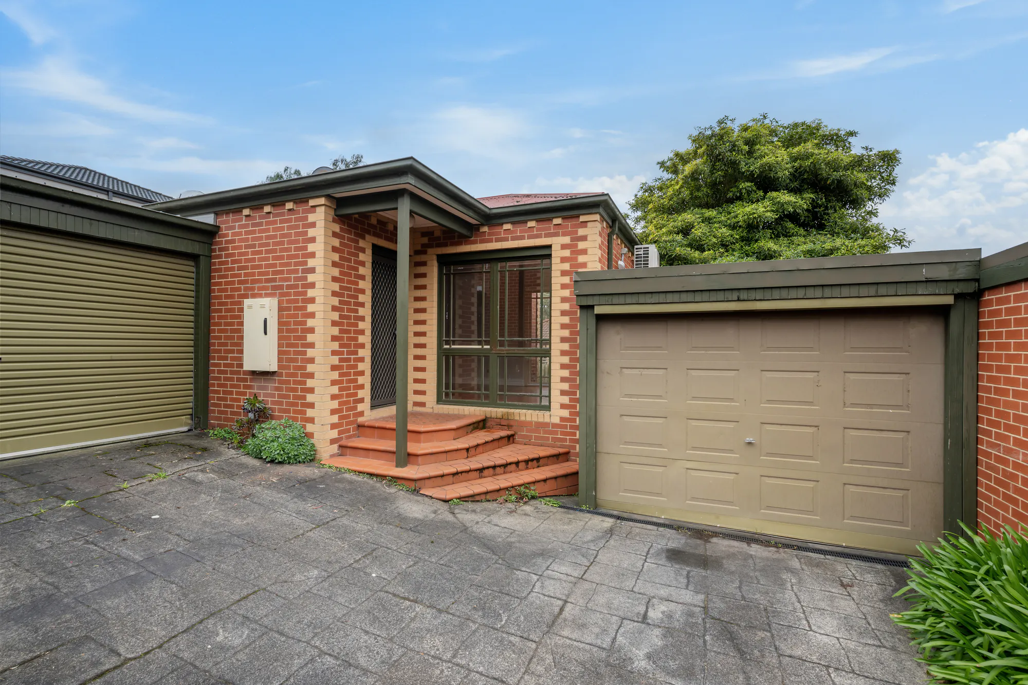 Real estate exterior before day-to-dusk conversion